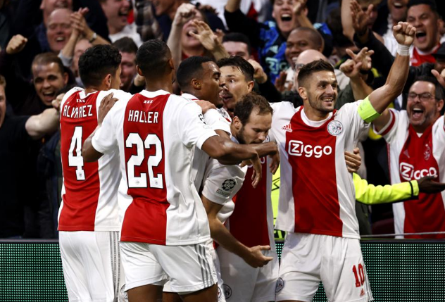  拜仁慕尼黑主场大胜多特蒙德登顶榜首